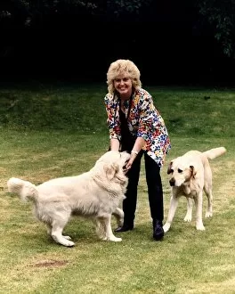 Gloria Hunniford TV Presenter at home with her dogs