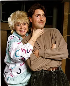 Gloria Hunniford TV and Radio Presenterwith her hand on Actor Gloria Hunniford TV and Radio Presenterwith her hand on Actor