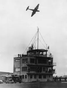 Gloster Meteor Aircraft passes over the Control Tower of Abbotsinch Airport, Paisley Gloster Meteor Aircraft passes over the Control Tower of Abbotsinch Airport, Paisley