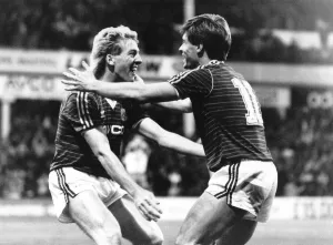 Goal. Frank McAvennie gets congratulations from team-mate Tony Cottee after scoring Goal. Frank McAvennie gets congratulations from team-mate Tony Cottee after scoring