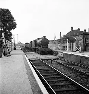 Goods train pulls into the railway station at Halesworth Suffolk. June 1952 C3365 Goods train pulls into the railway station at Halesworth Suffolk. June 1952 C3365
