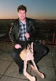 Gordon Kennedy TV Presenter of the National Lottery - sitting on a rocking horse Gordon Kennedy TV Presenter of the National Lottery - sitting on a rocking horse