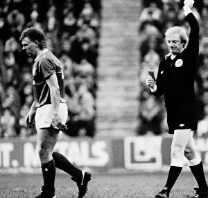 Images Dated 31st January 1987: Graham Roberts footbller Rangers FC football strip being sent off by referee red card in