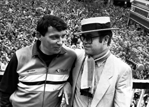 Images Dated 21st May 1984: Graham Taylor Watford manager shares an historic moment with his chairman Elton John