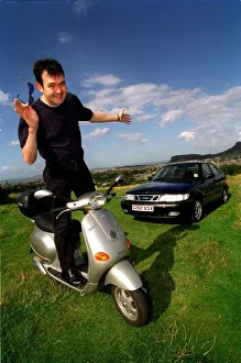 Grant Stott standing on Vespa scooter September 1998 Grant Stott standing on Vespa scooter September 1998