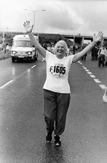 The Great North Run 27 June 1982 - Arms aloft runner Gladys Humpsih, 70 The Great North Run 27 June 1982 - Arms aloft runner Gladys Humpsih, 70