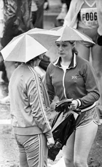 The Great North Run 27 June 1982 - Two runners keep dry before the race The Great North Run 27 June 1982 - Two runners keep dry before the race