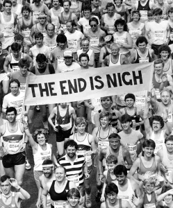 The Great North Run 30 June 1985 - Fun runners carrying a banner featuring the " The Great North Run 30 June 1985 - Fun runners carrying a banner featuring the "