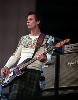 Guitarist from the Stereophinics performing on stage at T in the Park July 1999 wearing a Guitarist from the Stereophinics performing on stage at T in the Park July 1999 wearing a