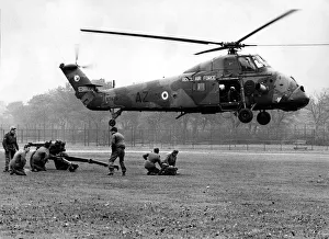 Images Dated 16th October 1970: A gun crew of the 14th Light Regiment, Royal Artillery, stand at the ready as a Royal Air