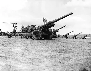 Gunners of a medium regiment of the Royal Artillery practice with 5.5 Gunners of a medium regiment of the Royal Artillery practice with 5.5
