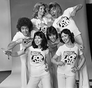 Images Dated 29th January 1976: Guys N Dolls pop group wearing Daily Mirror Pop Club T-shirts 29th January 1976