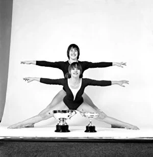 Images Dated 6th January 1975: Gymnastics: Gymnasts Elaine Willett and Ruty Adderley with D. M. Championship Cup