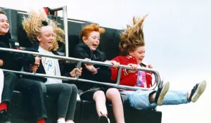 A hair raising experience for youngsters on one of the rides at a fair in the north east A hair raising experience for youngsters on one of the rides at a fair in the north east