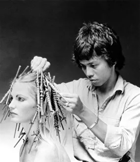Images Dated 15th June 1981: Hairdresser Allan Soh demonstrates the Chinese perm. June 1981 P007893