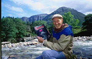Hamish McInnes author 3rd September 1989 Scots author holding copy of The Sunday Hamish McInnes author 3rd September 1989 Scots author holding copy of The Sunday
