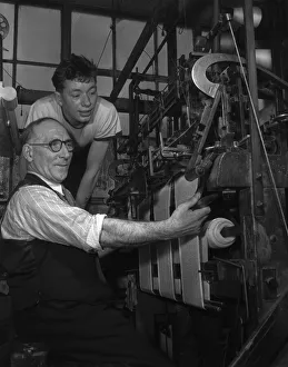 A handframe knitter seen here with his apprentice at The Shawl Factory of GH Hurt A handframe knitter seen here with his apprentice at The Shawl Factory of GH Hurt