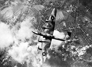 00492 Gallery: A Handley Page Halifax No 6 Group of RAF Bomber Command over the target during a daylight