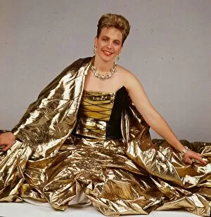 Images Dated 1st September 1988: Hazel Irvine TV presenter September 1988 wearing gold evenign sress sitting on floor
