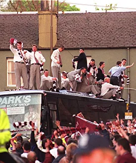 Heart of Midlothian football players waves to fans who have lined the streets of Heart of Midlothian football players waves to fans who have lined the streets of