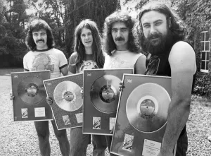 Heavy Metal group Black Sabbath pictured with the silver discs they received for Heavy Metal group Black Sabbath pictured with the silver discs they received for