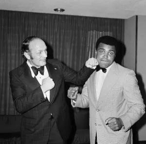 Muhammad Ali Gallery: Henry Cooper fooling around with fellow boxer Muhammad Ali at a press conference in
