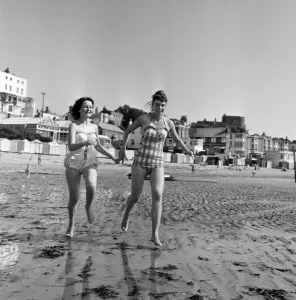 Holiday makers on the beach at Broadstairs, enjoying the sunshine Holiday makers on the beach at Broadstairs, enjoying the sunshine