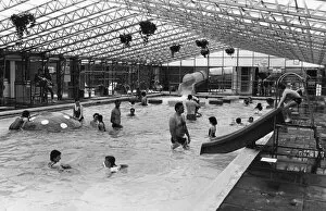 Images Dated 12th July 1988: Holiday makers enjoy the Swimming Pool at the Sun Centre, Trecco Bay, Porthcawl, Bridgend