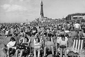 Sand Collection: Holidaymakers sunbathing on Blackpool beach Blackpool Tower August 1972