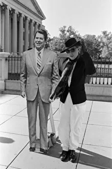 Images Dated 8th November 1984: Holly Johnson posing outside the White House with a full-size cutout of Ronald Reagan