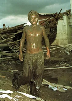 Honduras Hurricane Aftermath November 1998 Melvin boy aged 14 years old caked in Honduras Hurricane Aftermath November 1998 Melvin boy aged 14 years old caked in