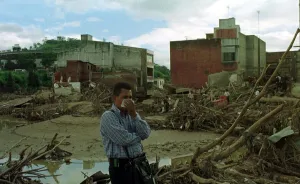 Honduras Weather Hurricane Mitch Nov 1998 Debris mounted up behind him Honduras Weather Hurricane Mitch Nov 1998 Debris mounted up behind him