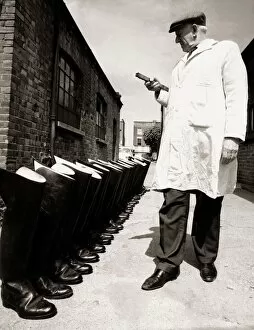 00154 Gallery: The household cavalrys Finest boots are given a final inspection by Mr Herbert