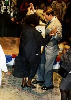 Images Dated 14th November 1988: HRH Prince Charles dances with a member of the crowd during 40th birthday celebrations