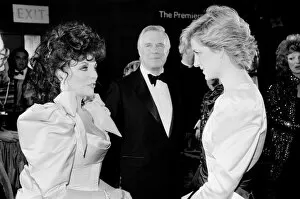Images Dated 23rd March 1987: HRH Princess Diana, The Princess of Wales (right) meets actor Joan Collins at the Film