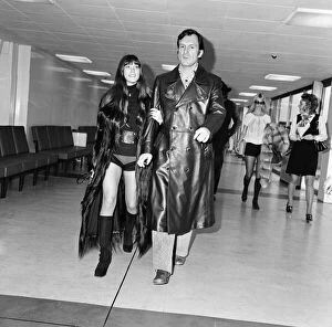 Images Dated 20th February 1971: Hugh Hefner and his girlfriend Barbi Benton at Londons Heathrow airport