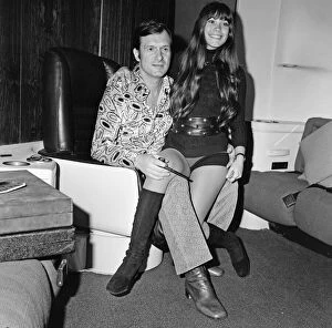 Images Dated 20th February 1971: Hugh Hefner pictured in the Playboy Jet with his girlfriend Barbi Benton