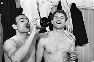 Ian St John of Liverpool drinks champagne 1966 with Roger Hunt after winning Ian St John of Liverpool drinks champagne 1966 with Roger Hunt after winning