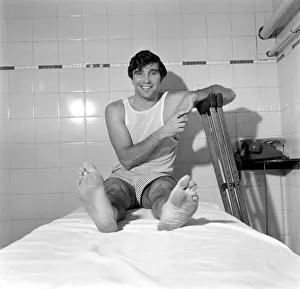 Injured player Johnny Quinn of Rotherham FC exercisingin the treatment room as he Injured player Johnny Quinn of Rotherham FC exercisingin the treatment room as he