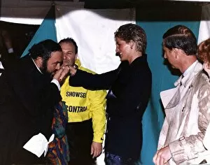 00146 Gallery: Italian opera singer Luciano Pavarotti kisses the hand of Princess Diana as Prince