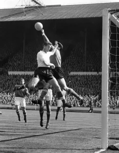 Italy goalkeeper Lorenzo Buffon saves from Peter Broadbent Italy goalkeeper Lorenzo Buffon saves from Peter Broadbent