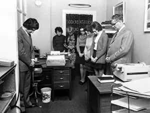 Images Dated 1st February 1974: 'Its eyes down in the office eyes down for a prayer. Then its down to work