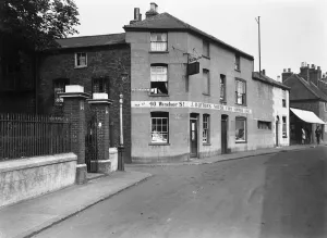 Cross Street Gallery: J Huttons noted Fish Supper Bar at Vine Street junction with Cross Street, Uxbridge