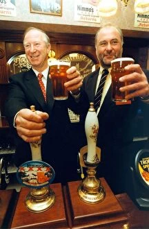 Images Dated 1st January 1999: Jack Charlton pulls the first pint of Nimmos XXXX, alongside Jim Kerr