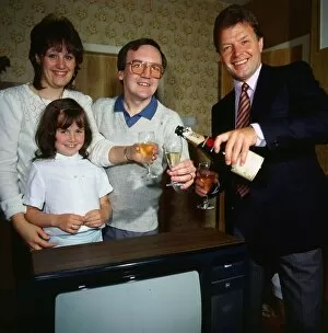 Jack McLaughlin television presenter February 1989 pouring champagne with an unnamed