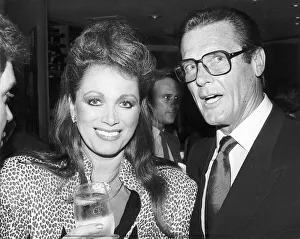 Jackie Collins Author With Actor Roger Moore Dbase Jackie Collins Author With Actor Roger Moore Dbase