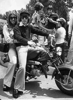 Images Dated 1st June 1973: JACKIE STEWART AND WIFE HELEN ON A MOTOR BIKE AFTER HIS MONACO GRAND PRIX VICTORY JUNE
