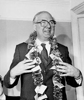 James Callaghan wearing garland of flowers and money in Brentford - April 1979