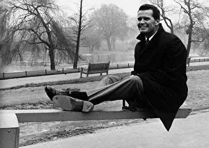 James Garner American actor sitting on see saw 1964 James Garner American actor sitting on see saw 1964