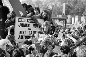 Images Dated 8th November 1976: James Hunt and Niki Lauda get trapped by fans at Brands Hatch